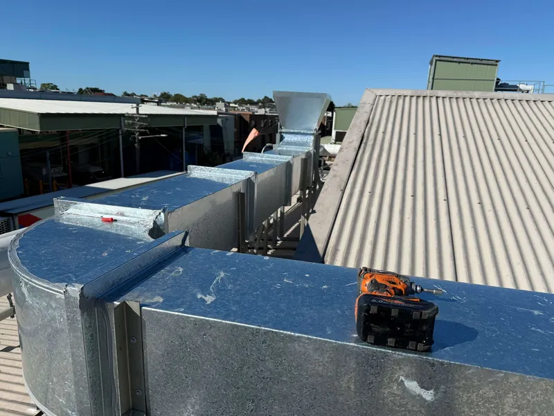 Installed rooftop ductwork and ventilation equipment